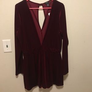 Maroon velvet romper.